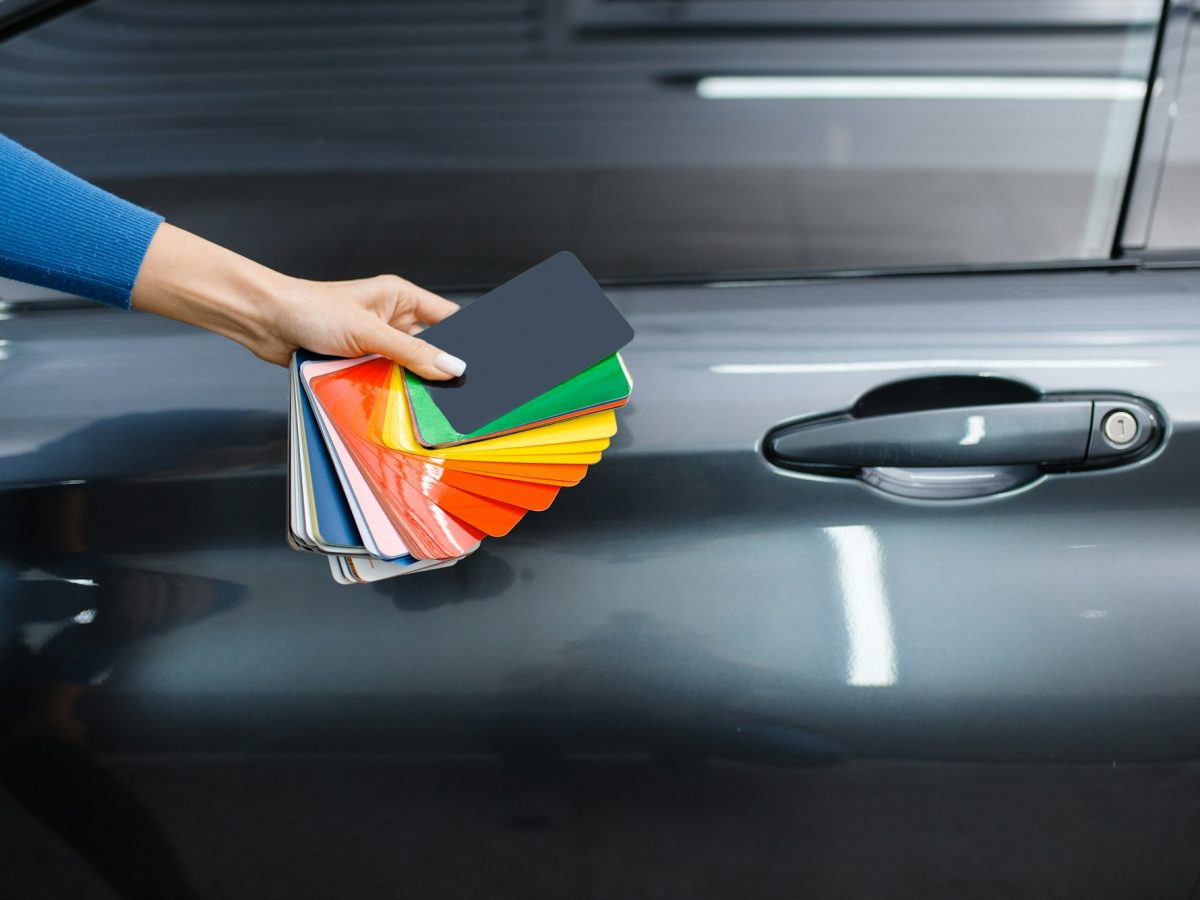 Car wrapping, hand with foil or film color palette
