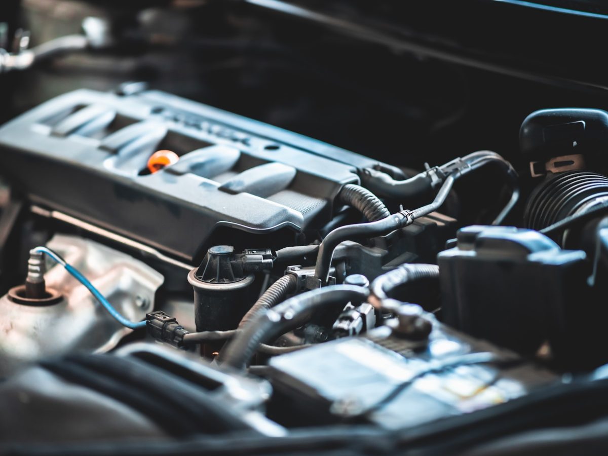 mechanic car service worker man technician are maintenance or repair vehicle car engine in garage
